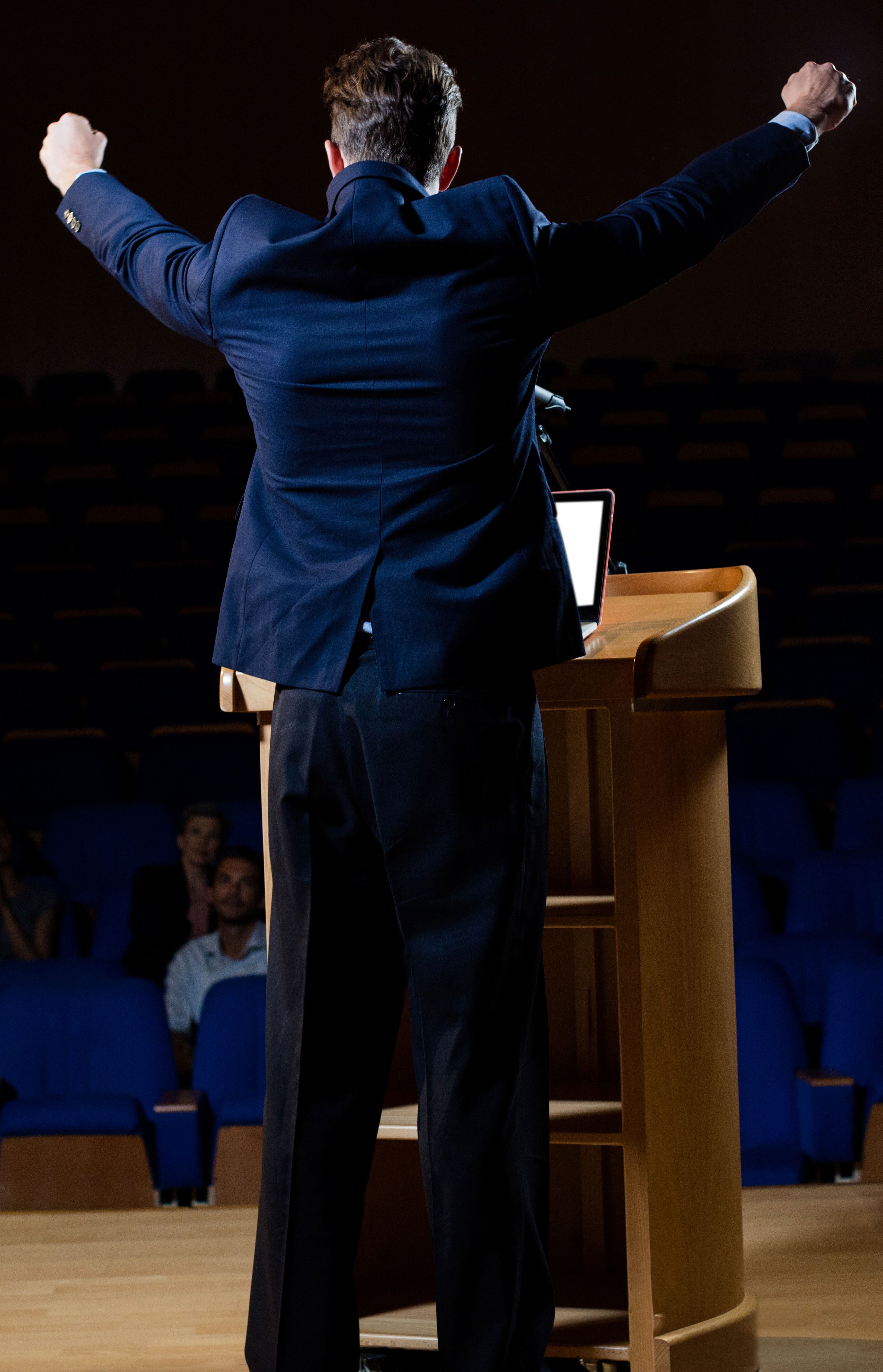 Male business executive giving speech 1